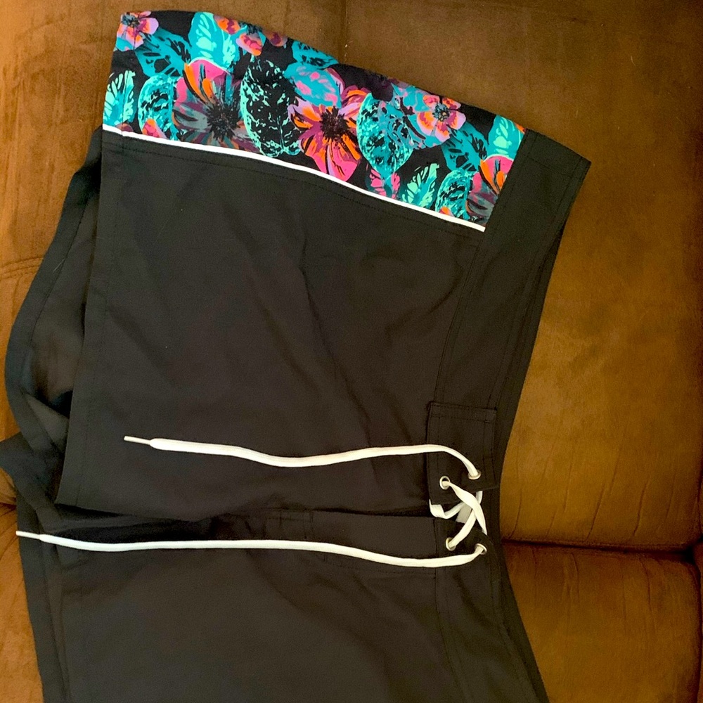 Swim board shorts women NWT .